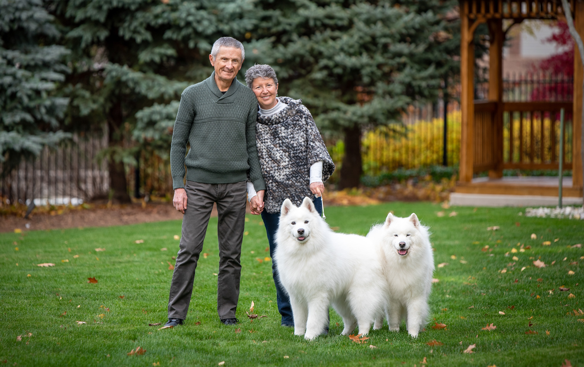 what to wear with white dogs, couple in neutrals with their Samoyeds in Grimsby